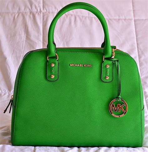 mint green michael kors purse.